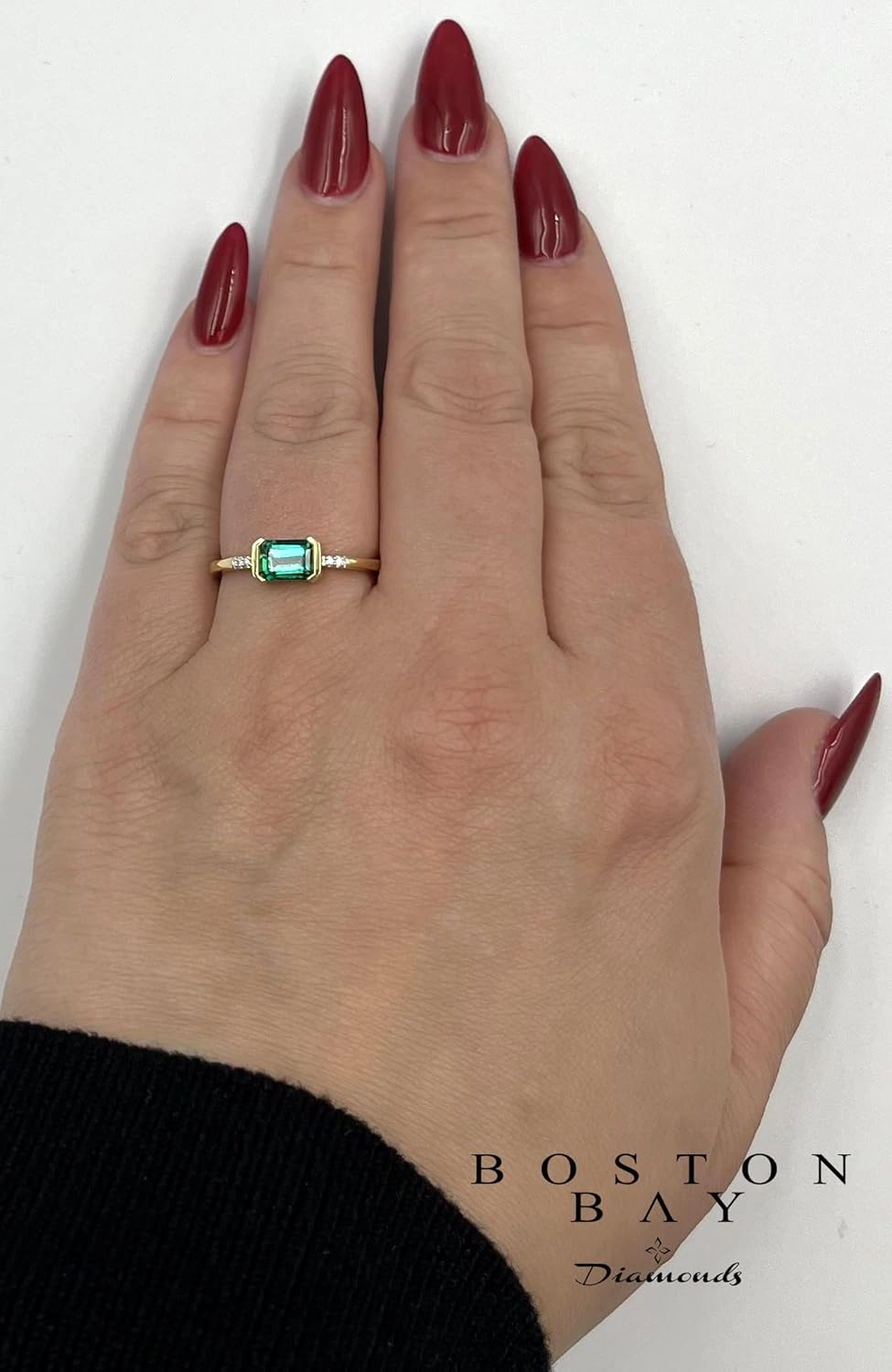 Boston Bay Diamonds 14K Yellow Gold Plated or Rhodium Plated 925 Sterling Silver Diamond and East-West 7x5mm Emerald Cut Gemstone Statement Solitaire Ring
