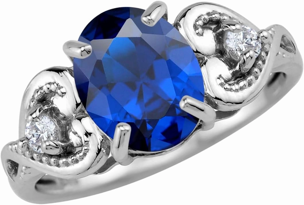 Silvershake 10X8mm Created Oval Shape Blue Sapphire White Gold Plated 925 Sterling Silver Heart Victorian Style Ring September Gemstone Birthstone Size 6