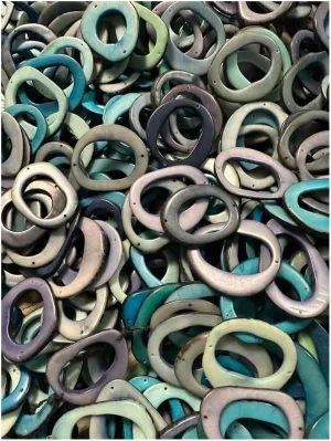 Tagua Nut Ring/Disc/Hoop/Donut. Mix of Blue Colors. 20 Tagua Nut Beads. Top and Bottom Drilled. Size: 1.6 x 1.2 inches Approx. Natural Jewelry Making Supplies. Eco-Friendly Tagua DIY Jewelry